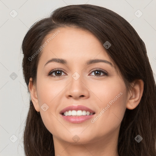 Joyful white young-adult female with long  brown hair and brown eyes