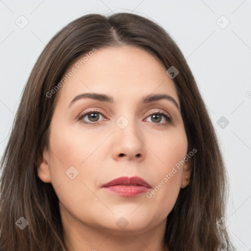 Neutral white young-adult female with long  brown hair and brown eyes