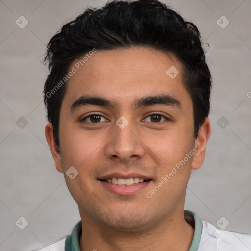 Joyful white young-adult male with short  black hair and brown eyes