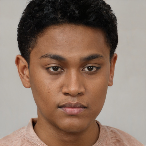 Neutral black young-adult male with short  brown hair and brown eyes