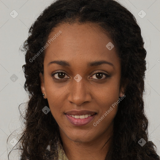 Joyful black young-adult female with long  brown hair and brown eyes