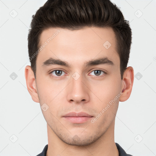 Neutral white young-adult male with short  brown hair and brown eyes