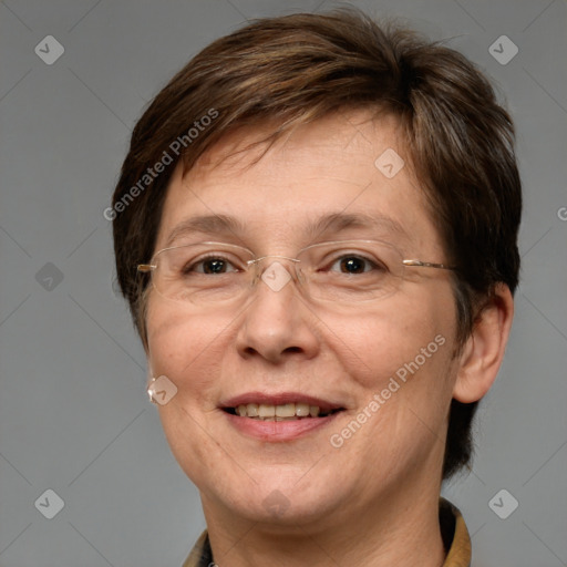 Joyful white adult female with short  brown hair and grey eyes