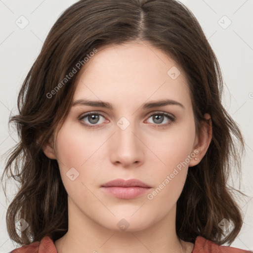 Neutral white young-adult female with medium  brown hair and brown eyes