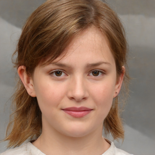 Joyful white child female with medium  brown hair and brown eyes