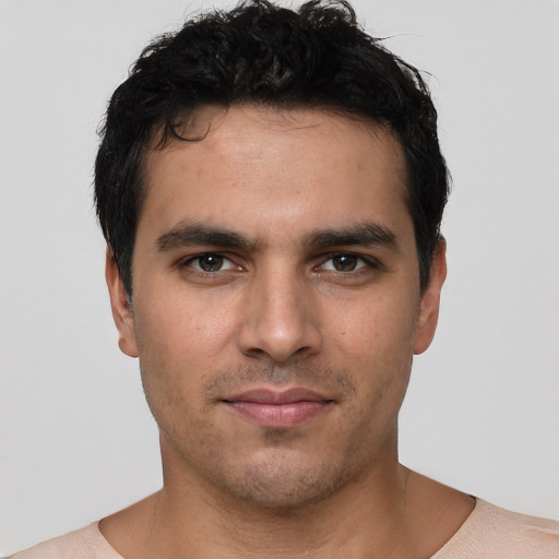 Neutral white young-adult male with short  black hair and brown eyes