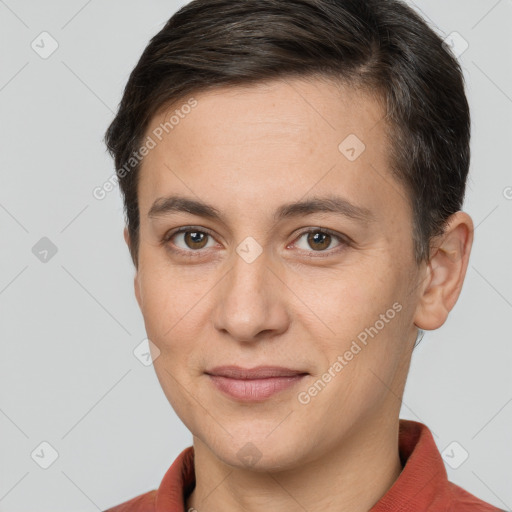 Joyful white young-adult female with short  brown hair and brown eyes