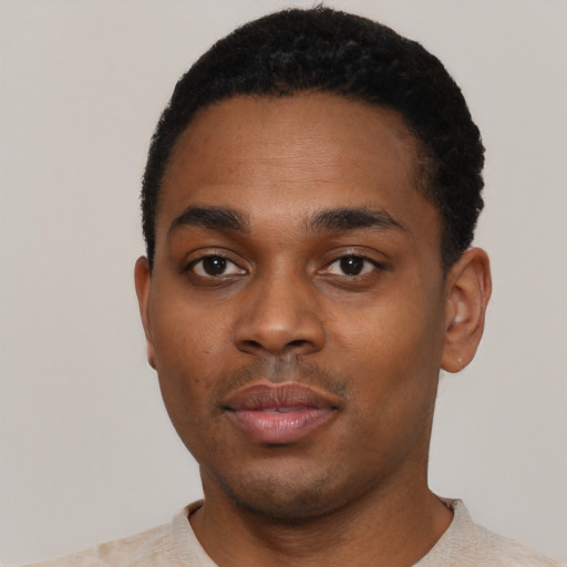Neutral black young-adult male with short  black hair and brown eyes