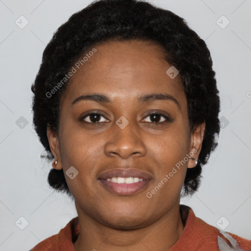 Joyful black young-adult female with medium  black hair and brown eyes