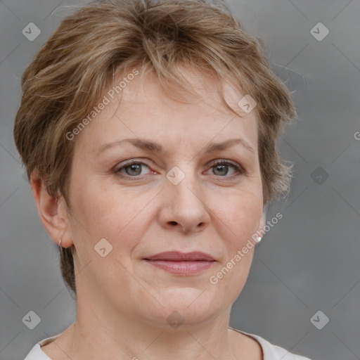 Joyful white adult female with short  brown hair and grey eyes