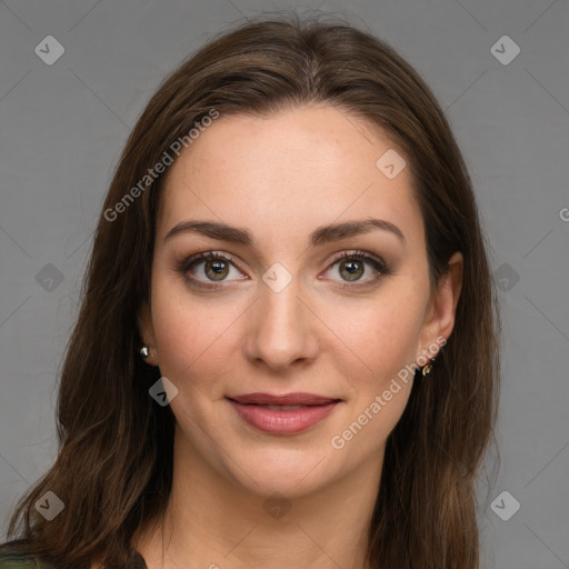 Joyful white young-adult female with long  brown hair and green eyes