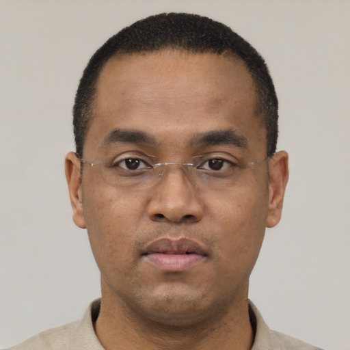 Neutral black young-adult male with short  black hair and brown eyes