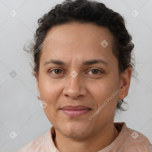 Joyful white adult female with short  brown hair and brown eyes