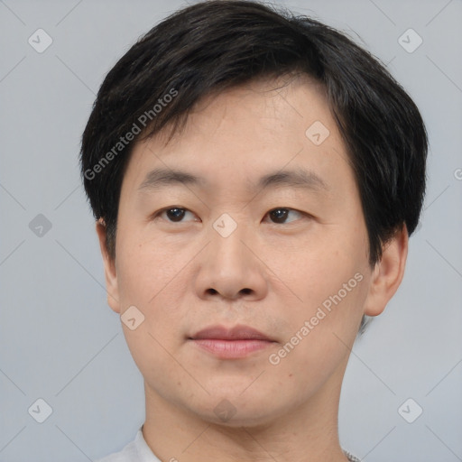 Neutral asian young-adult male with short  black hair and brown eyes