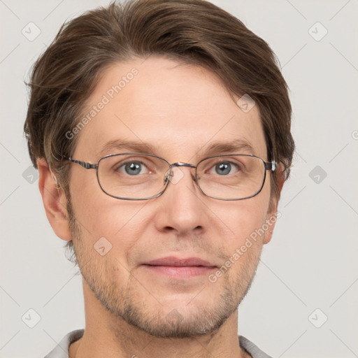 Joyful white adult male with short  brown hair and grey eyes