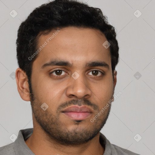 Neutral latino young-adult male with short  brown hair and brown eyes