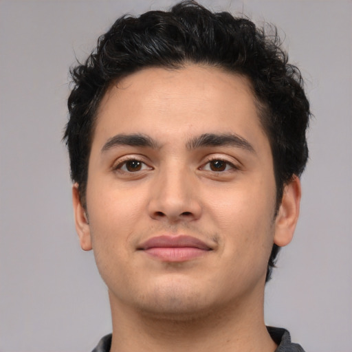 Neutral white young-adult male with short  black hair and brown eyes