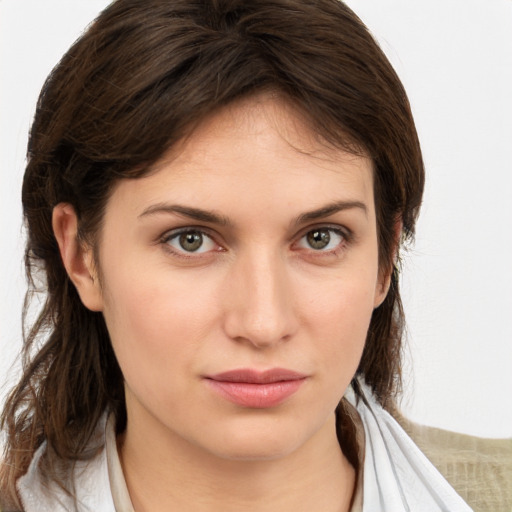 Neutral white young-adult female with medium  brown hair and brown eyes