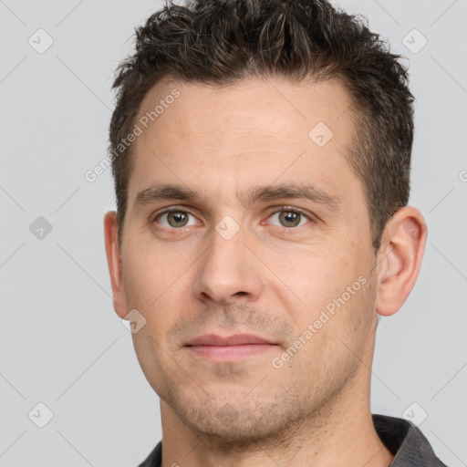 Neutral white adult male with short  brown hair and brown eyes