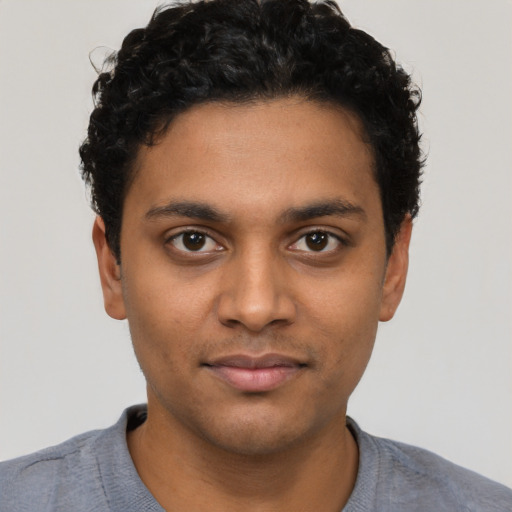 Neutral latino young-adult male with short  brown hair and brown eyes