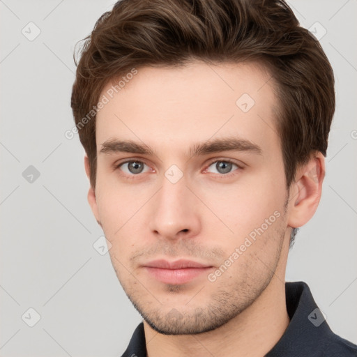 Neutral white young-adult male with short  brown hair and grey eyes