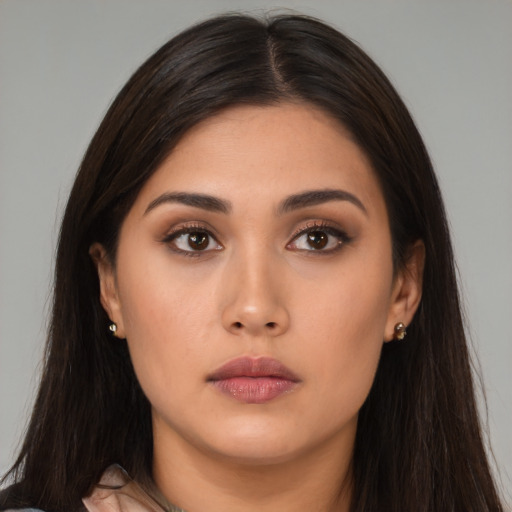 Neutral asian young-adult female with long  brown hair and brown eyes