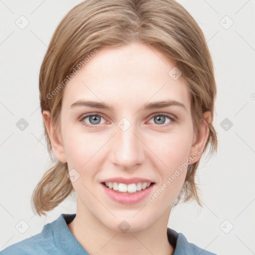 Joyful white young-adult female with medium  brown hair and blue eyes