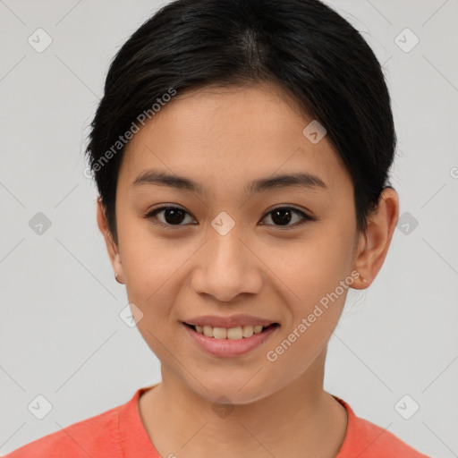 Joyful asian young-adult female with short  brown hair and brown eyes