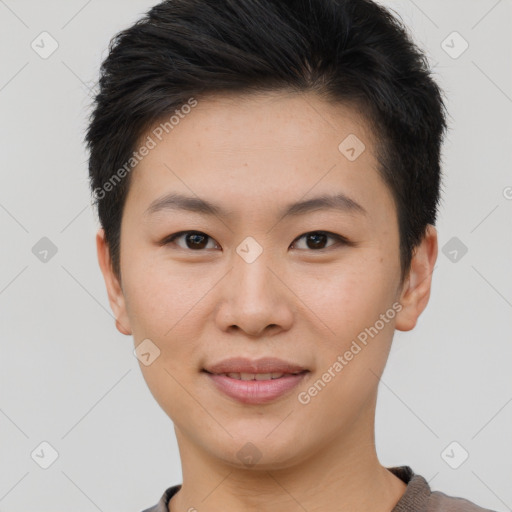 Joyful asian young-adult female with short  brown hair and brown eyes