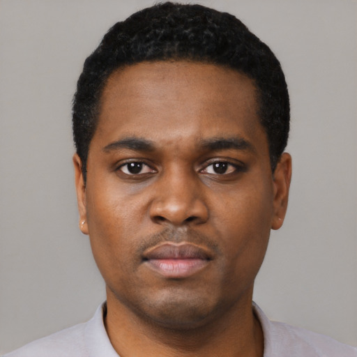 Neutral black young-adult male with short  black hair and brown eyes