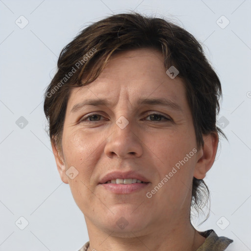 Joyful white adult female with medium  brown hair and brown eyes