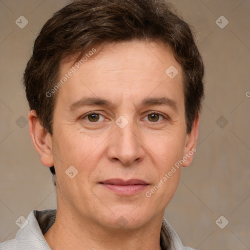 Joyful white adult male with short  brown hair and grey eyes