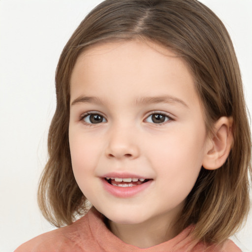 Joyful white child female with medium  brown hair and brown eyes