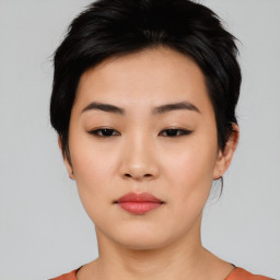 Neutral asian young-adult female with medium  black hair and brown eyes