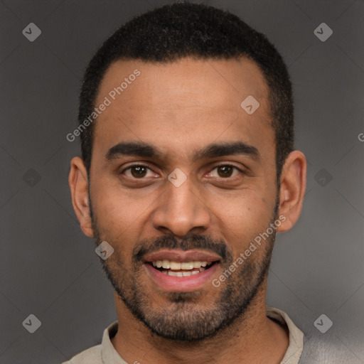 Joyful white young-adult male with short  black hair and brown eyes