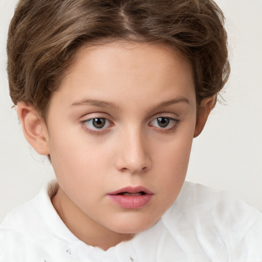 Neutral white child female with short  brown hair and brown eyes