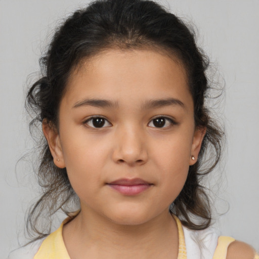 Neutral latino child female with medium  brown hair and brown eyes