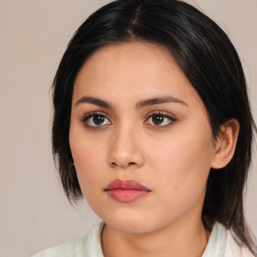 Neutral asian young-adult female with medium  black hair and brown eyes