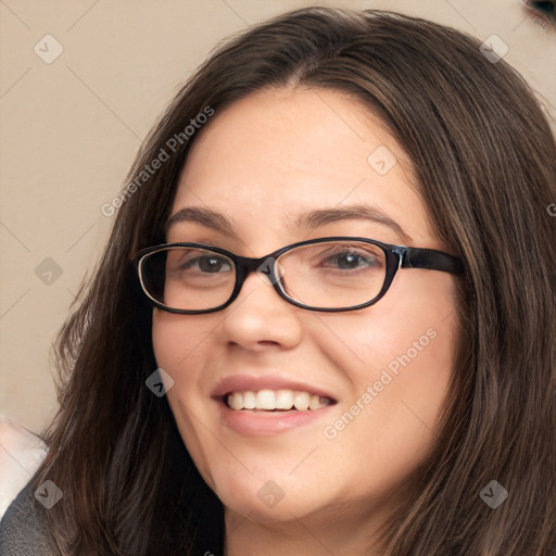 Joyful white young-adult female with long  brown hair and blue eyes