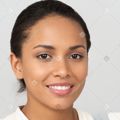 Joyful latino young-adult female with short  brown hair and brown eyes