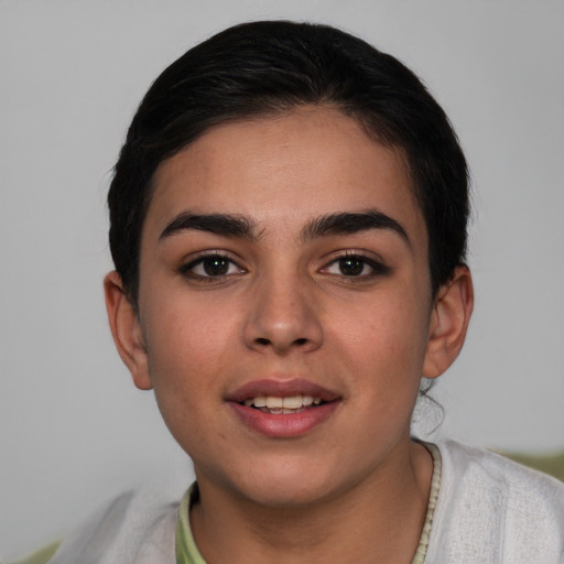 Joyful white young-adult female with short  brown hair and brown eyes