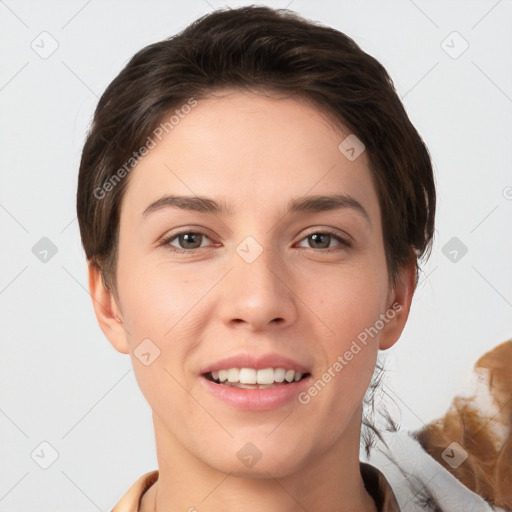 Joyful white young-adult female with short  brown hair and brown eyes