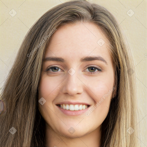 Joyful white young-adult female with long  brown hair and grey eyes