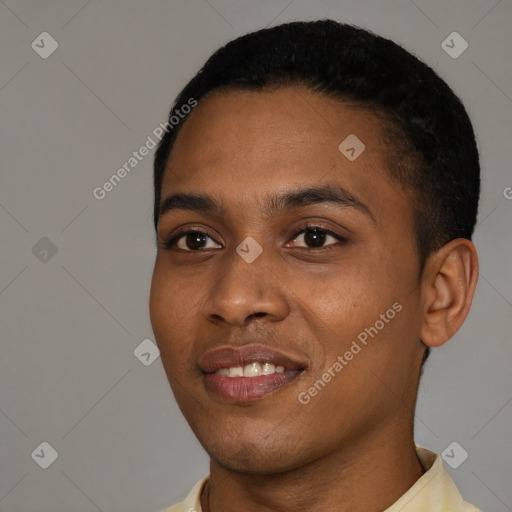 Joyful black young-adult male with short  black hair and brown eyes