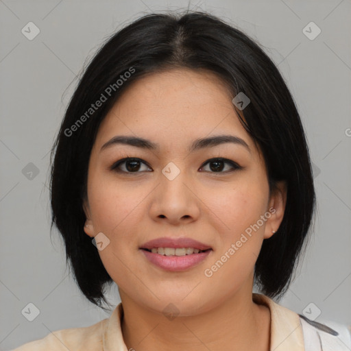 Joyful asian young-adult female with medium  black hair and brown eyes