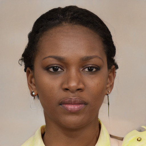 Neutral black young-adult female with short  brown hair and brown eyes