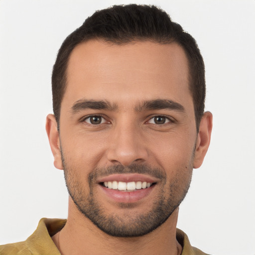 Joyful white young-adult male with short  brown hair and brown eyes