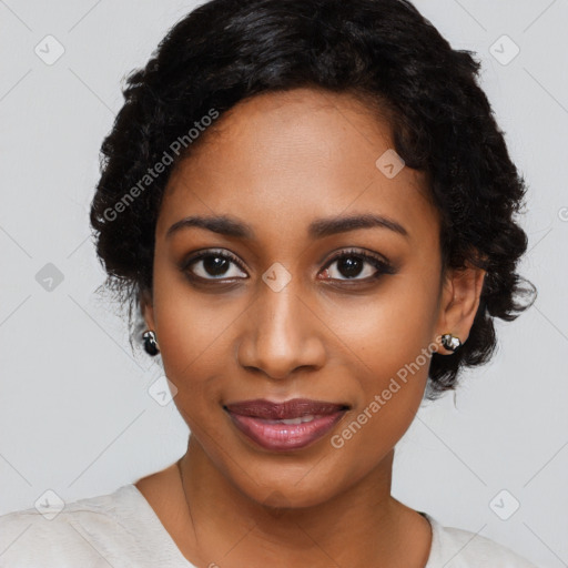 Joyful black young-adult female with medium  black hair and brown eyes