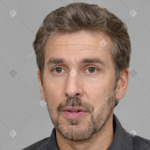 Neutral white adult male with short  brown hair and brown eyes