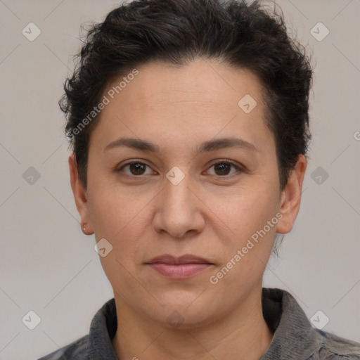 Joyful white adult female with short  brown hair and brown eyes